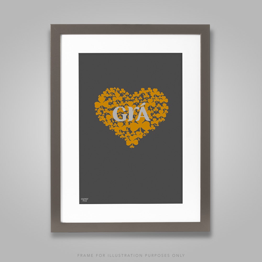 For illustration purposes only - Grá (Irish for 'love') amber shamrock heart on graphite background A4 print, framed with mount in 300mm x 400mm black frame.