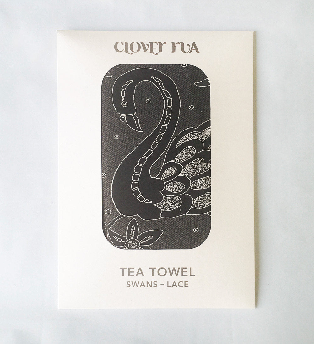 Swans Irish Lace design tea towel, in specially designed packaging.